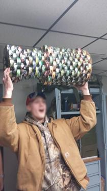 So this guy walks into my friends barracks holding this trophy made of dip cans