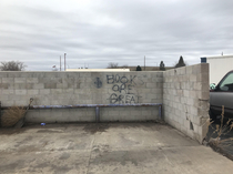 Some graffiti I found in the parking lot of a local restaurant that says Books are great I agree with the message but not the delivery