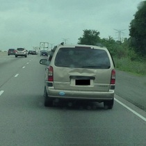 Someone got close enough to give this van a kiss and leave an impression 