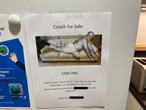 Someone is selling a couch at workhad to fix the picture