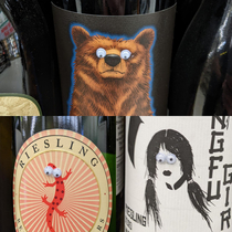 Someone put googly eyes on the wine bottles