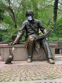 Someone put masks on some of the statues in New York