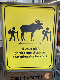 Store entrance sign about social distancing Cant get more Canadian than that