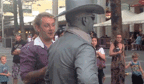 Street performer punches douchebag
