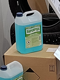 SUPERPISS the actual brand of windshield washer fluid that my local car repair shop sells