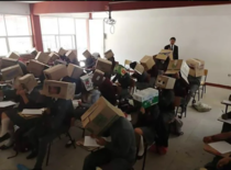 Teacher asks pupils to wear cardboxes on their heads to stop them from cheating