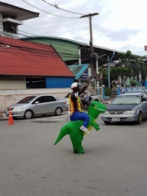 Thai police officer having fun on the job