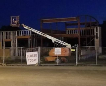 Thank God McDonalds put that sign up I was just about to climb the fence side step the scaffolding squeeze through the framing and order some McNuggets Guess Ill have to check back tomorrow