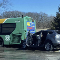 The ad on the back of the bus is for Pinkeys Auto Body Quack up Duck in for a free estimate