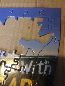 The company who made this puzzle hid a cat in it
