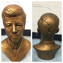 The design of my JFK coin bank used an unfortunate spot for the coin slot