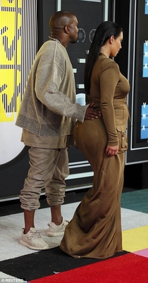 The funny part is that KANYE and Kim look like medieval peasants The sad part is that his sweater Probably costs more than my car