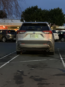 The irony of the one badly parked car in the lot