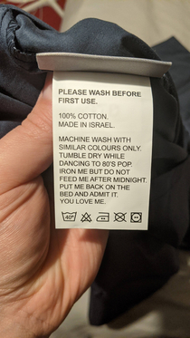 The label on my new fitted bed sheet Slightly afraid of washing it if I shouldnt feed it after midnight