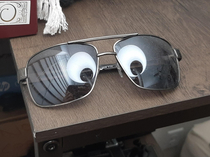 The lamp looks like googly eyes on my shades