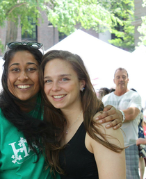 The Man In The Back Of His Picture Looks Like His Hand Is On The Girls Shoulder