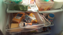 The meat and cheese drawer of a two person household in WI