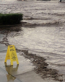 The monsoons have finally hit Thankful I put out this wet floor sign to warn the folks