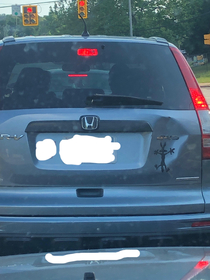 The placement of this Wile E Coyote bumper sticker