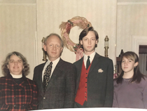 The pocket square in this old Christmas photo is a hamster 