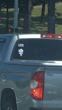 The Punisher symbol with a certain comb-over hairstyle