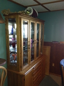 The queen on top of her buffet hutch throne