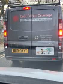 The registration plate for this drain cleaning company van