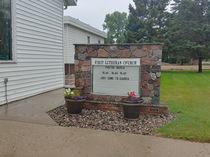 The sign in front of a small town church