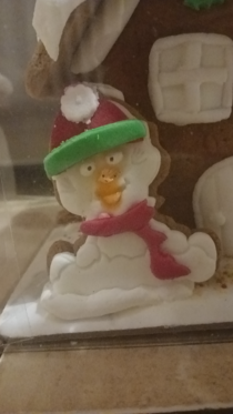The snowman on our gingerbread house is weird