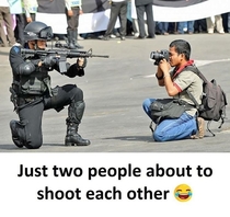 The two people shooting each other 