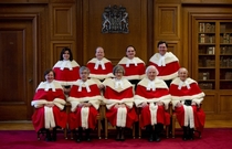 The uniforms for the Canadian Supreme Court makes the judges look like Santa Clauses in training