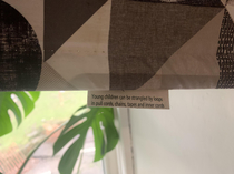 The warning label on my blinds reads like a game loading screen tip