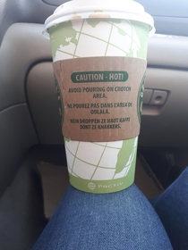 The warning on this coffee cup