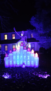 These people got creative with their decorations again This time the skeleton is roasting a marshmallow