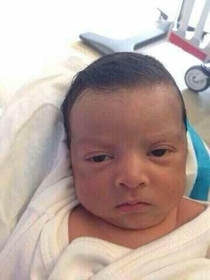This baby is a whole  mins old amp already fed up with life