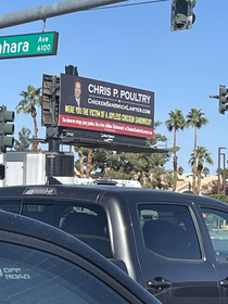 This Billboard next to a Popeyes in Las Vegas