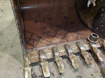 This bucket sent in for repair had an interesting message from the welder