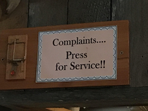 This complaint button I saw at a restaurant its a mouse trap