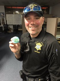 This cop and his birthday cupcake
