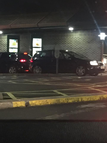 This dude just drove backawrds into drive-thru