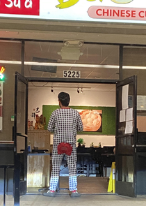 This guy picking up Chinese food ahead of me last night in his Christmas pajamas