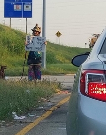 This guy was standing on the corner of a highway exit in my town