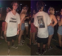 This guys girlfriend couldnt come to the festival with him so she got him a new shirt