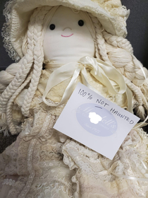 This handmade doll was donated to a silent auction Im working on