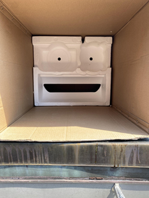 This happy guy hiding in a box 