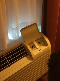 This hotel room AC has seen some shit