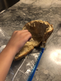 This is how my son eats a loaf of bread What kind of monster have I unleashed upon this world