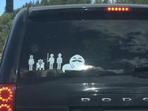 THIS is really sweet Someone put a Star Wars themed family on the back of his car And he even included his mother-in-law