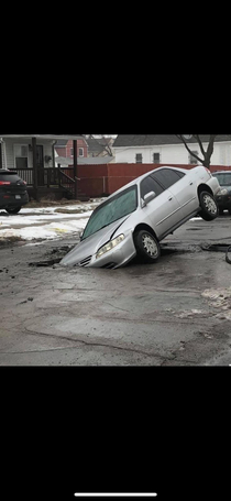 This just happened in Detroit We make cars but not roads to drive on Smfh