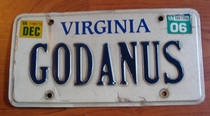 this license plate was on an elderly couples car for many years its supposed to read God and Us